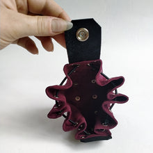Load image into Gallery viewer, Leather pouch with elastic draw string. The lid is secured with a heavy snap. Handmade in New Zealand by Gemma Proebst.
