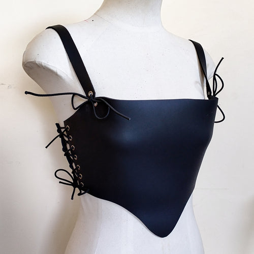 Adjustable Corset in 2mm thick matte black leather and silky black leather lining. Handmade in New Zealand by Gemma Proebst.