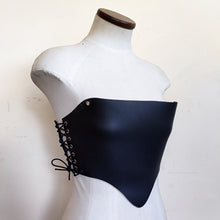 Load image into Gallery viewer, Adjustable Corset in 2mm thick matte black leather and silky black leather lining. Handmade in New Zealand by Gemma Proebst.
