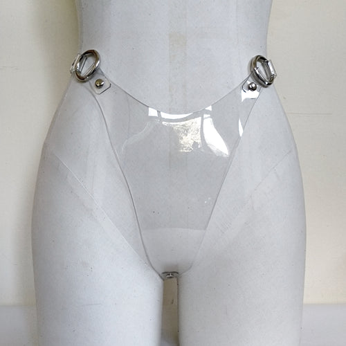 Adjustable high cut thong in 2mm thick clear PVC and nickel hardware. The side straps sit at waist height. handmade by Gemma Proebst in New Zealand.