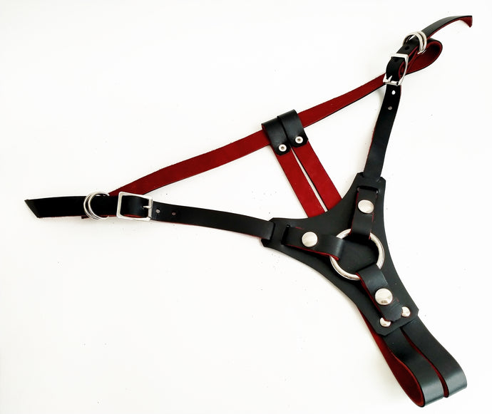 Gemma Proebst Adjustable strap-on harness in matte black with blood red suede lining, handmade in New Zealand